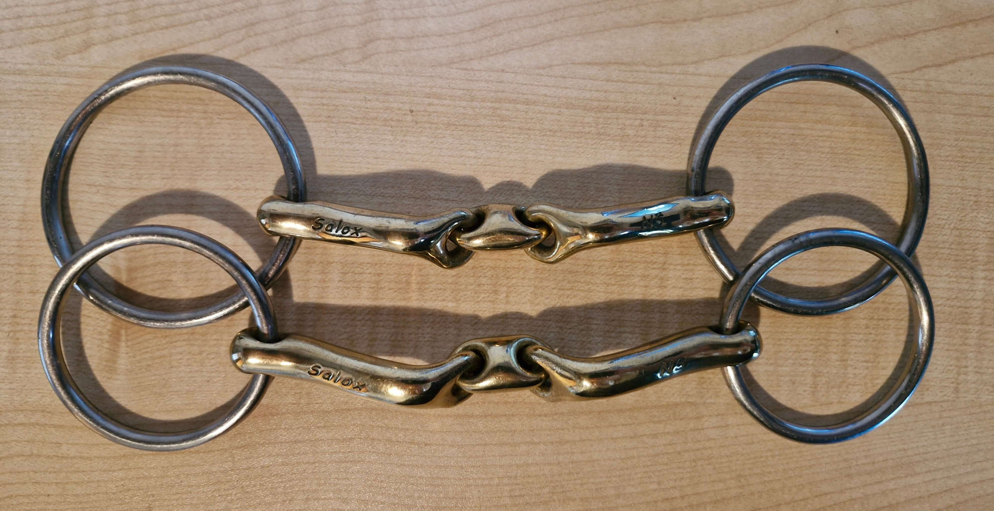 Used Neue Schule Verbindend bit with 4.5" loose ring and 5" bradoon, in good condition, ideal for horse riding.