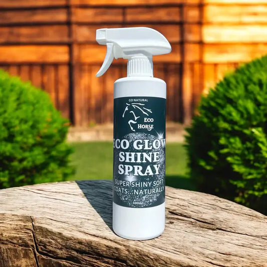 Eco Horse Glow Shine Spray bottle on wooden surface, highlighting natural coat shine and softness for horses.
